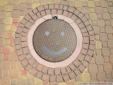 a very happy manhole, at denia marina
